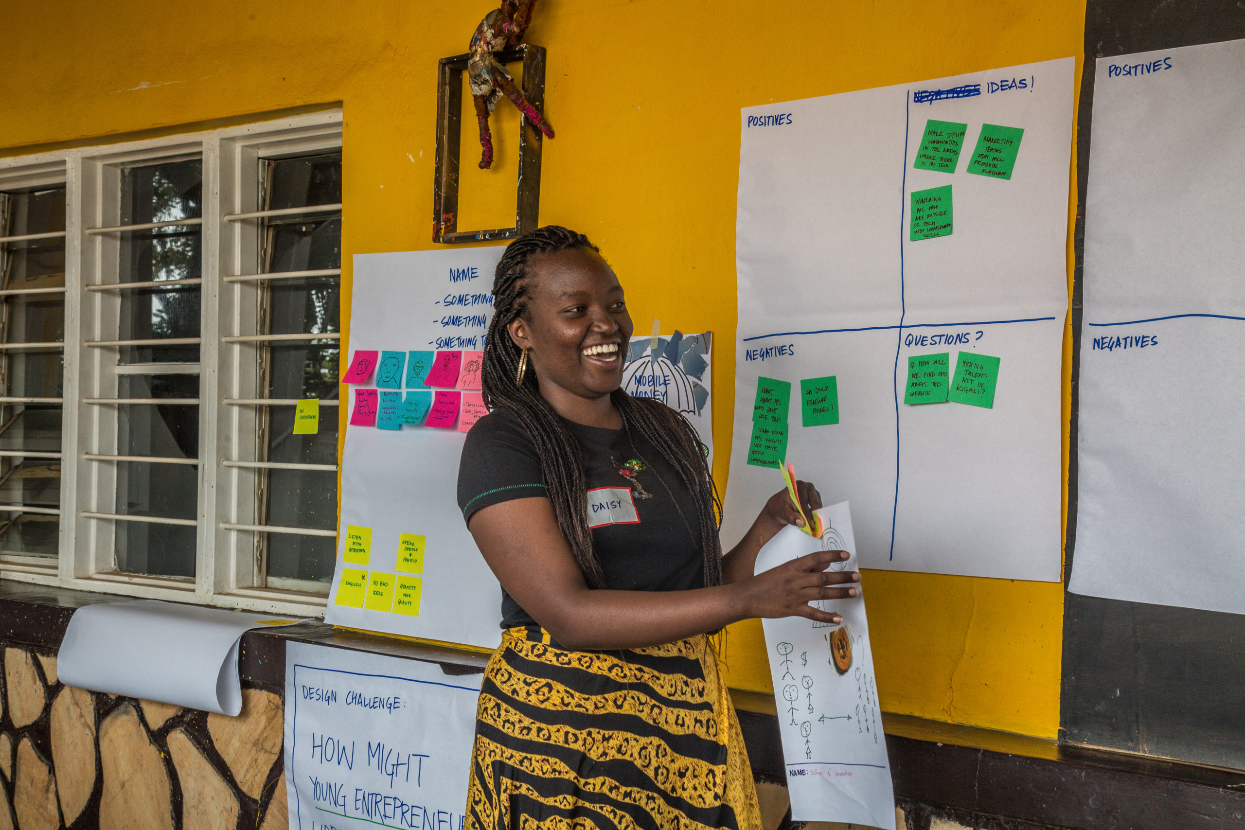 Daisy Isimbi pictured here, a 21-year-old university student studying Business Management in Kigali. Here she's helping run a workshop for Youth Development Labs (YLabs), which conducts a co-design workshop exploring methods to connect young Rwandan entrepreneurs and unemployed youth. 