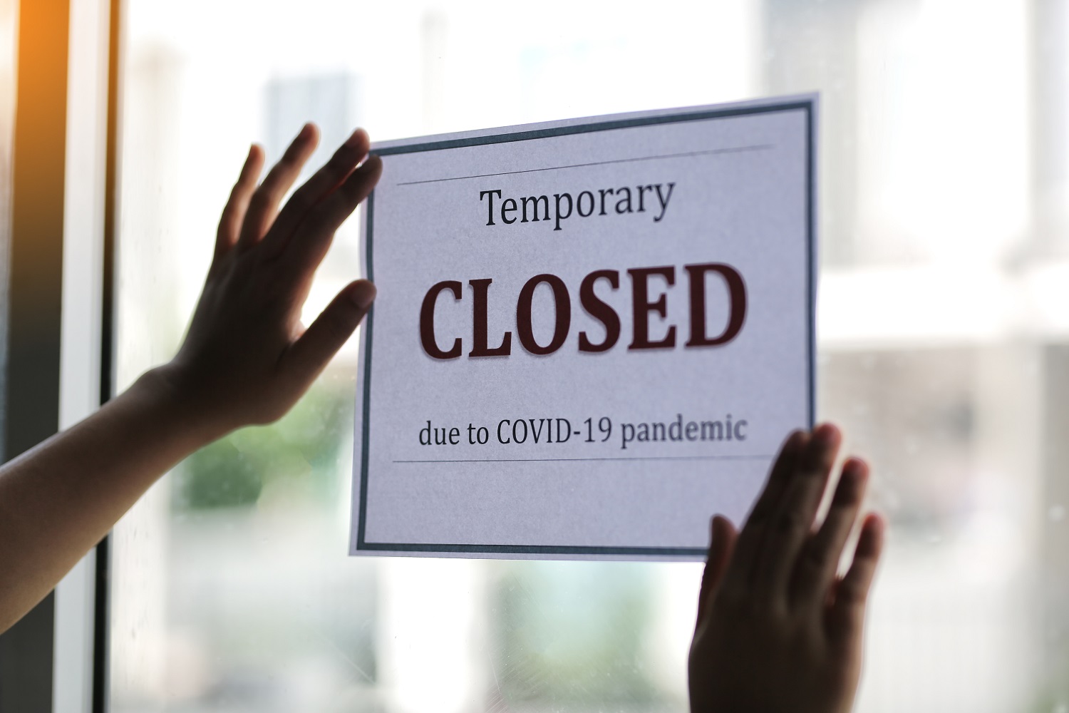 Image of temporarily closed sign for COVID 19