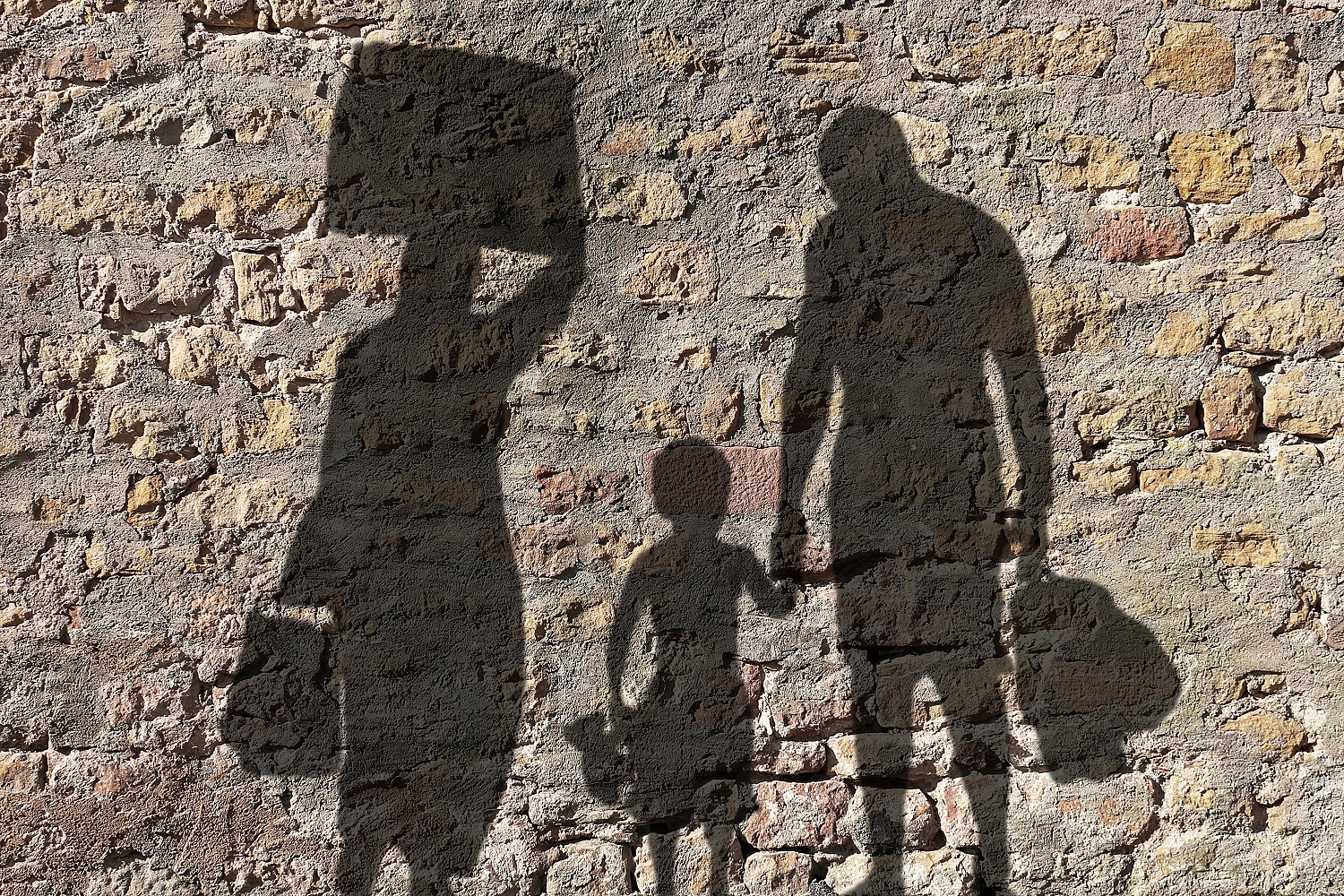 Silhouette of a refugee family