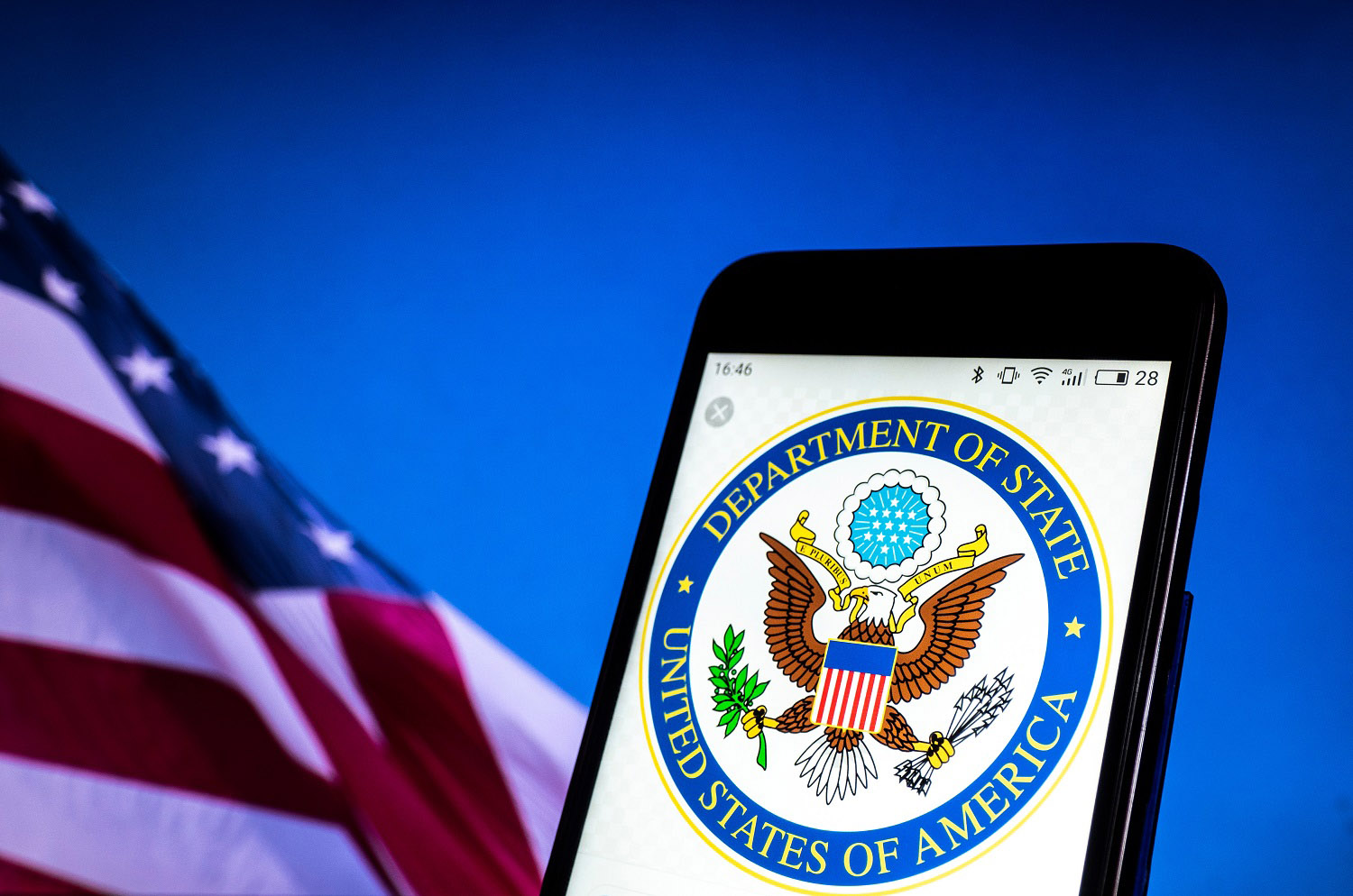 Department of State logo is seen on smartphone
