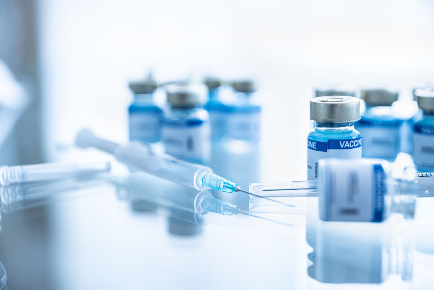 vaccine and syringe