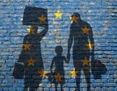 The silhouettes of a mother, father, and child, with suitcases, in front of an EU flaf