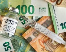 An image of the Covid vaccine placed on top of Euro's.